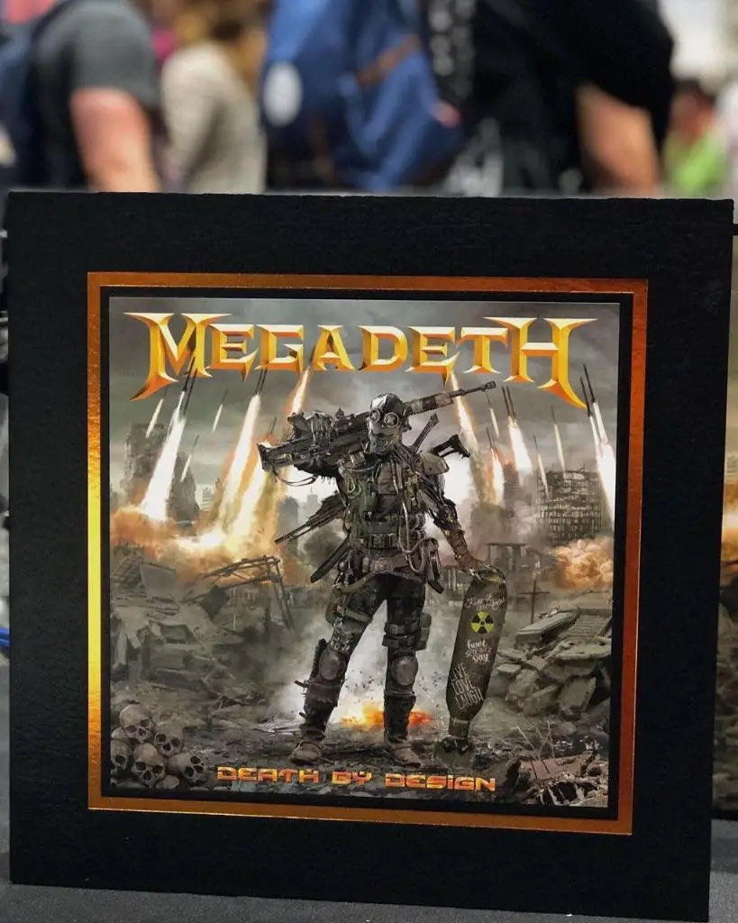 Get a Signed 'Death by Design' Print at Comic-Con! – Megadeth